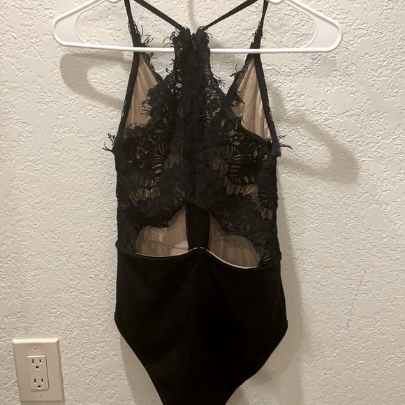 Black laced bodysuit zipper in back. Size Small - Picture 2 of 3